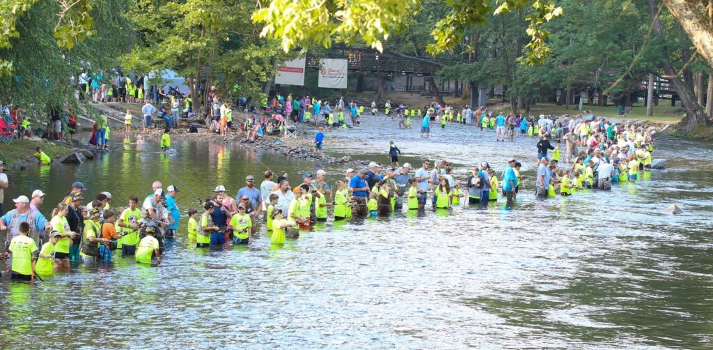 children participating in the cherokee trout fishing derby copy