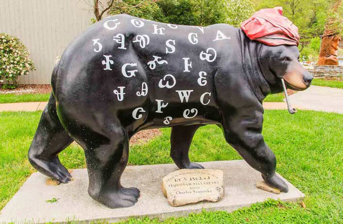 colorful bear sculpture from Cherokee Bears Project sequoyah bear