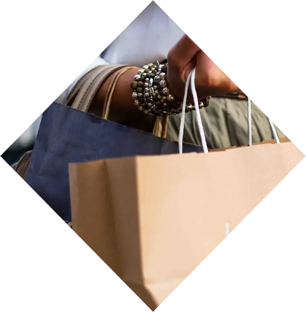 shopping bags on woman's arm